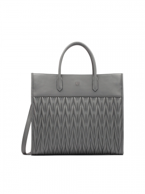 Nagy szürke kézitáska fogantyúkkal és steppelt testtel 