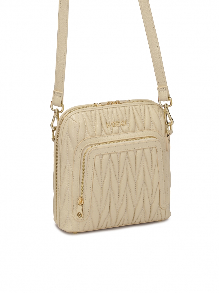 Bézs színű kézitáska feltűnő steppeléssel  CARIN